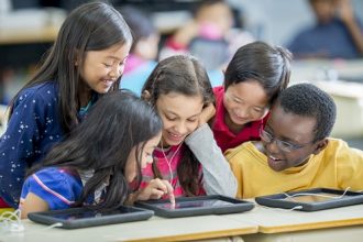 Children Playing Games on a Tablet