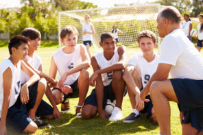 Students and Soccer Coach