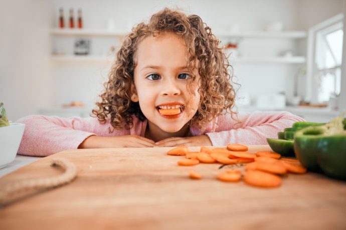 kid eating carrots