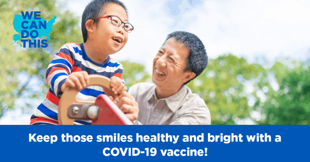 Father and son playing in the park.