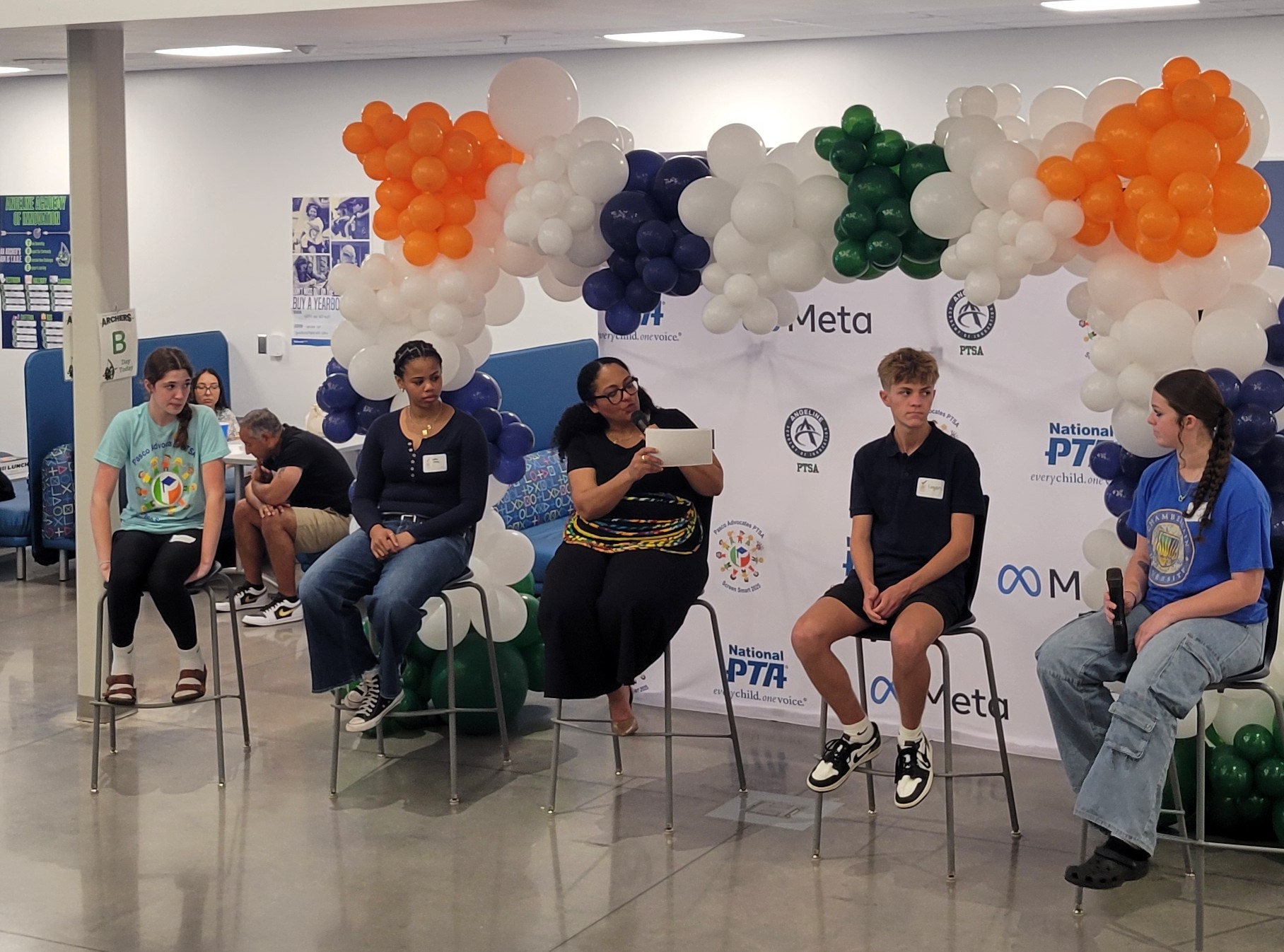 Teens on a panel discussion