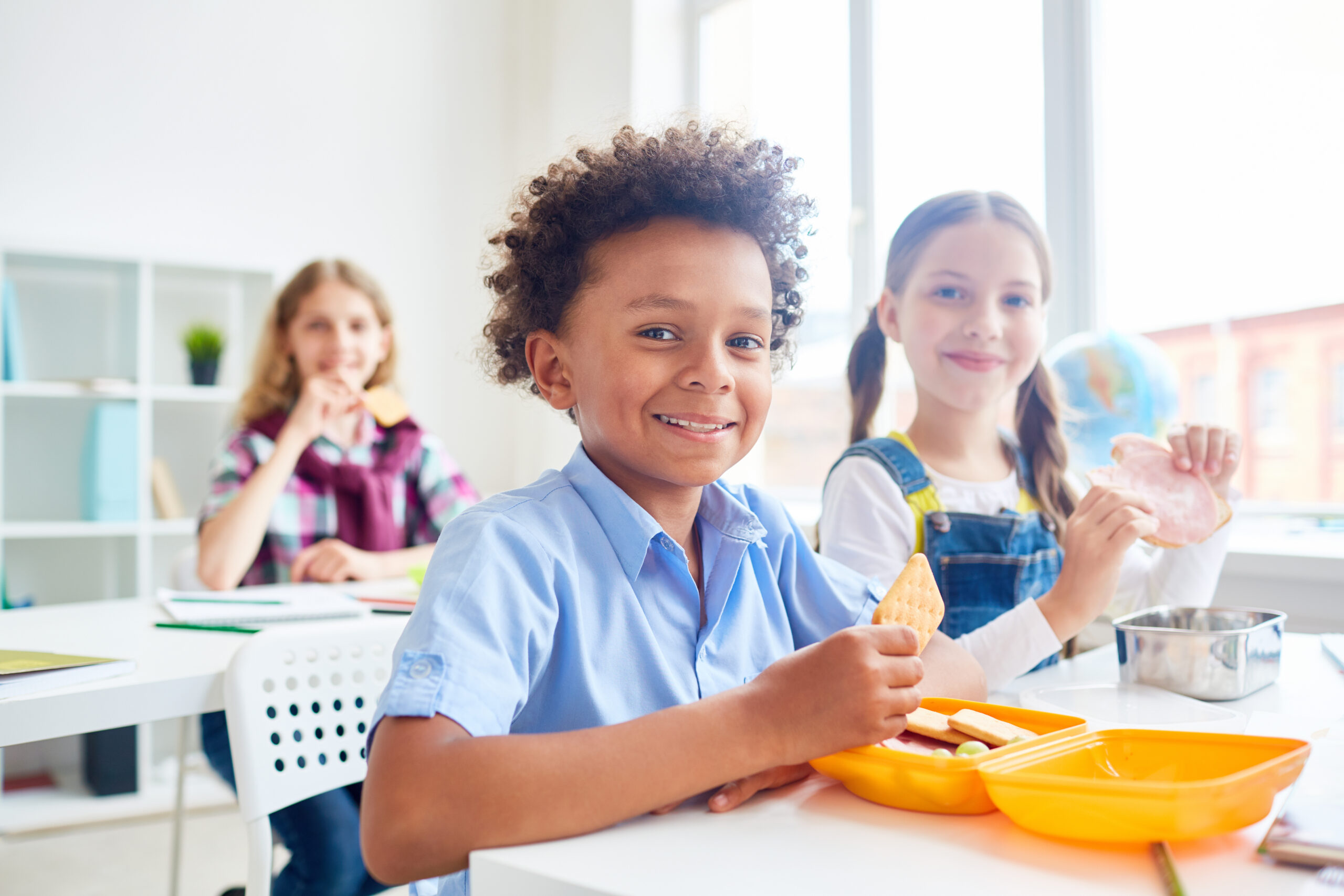 Child eating healthy food.