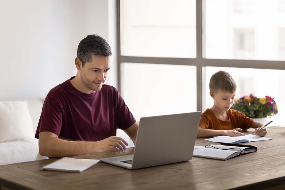 Dad and son doing homework